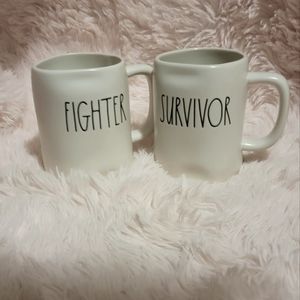 Rae Dunn Fighter & Survivor mugs